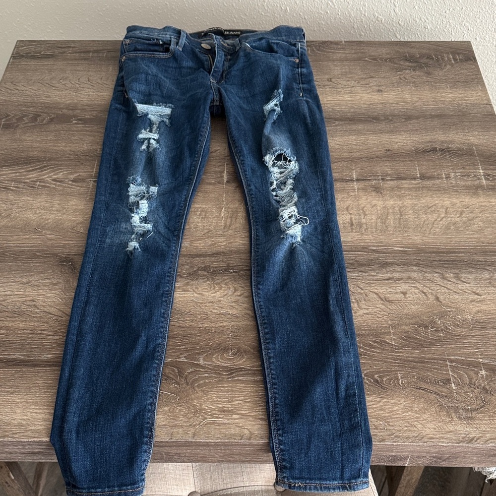 Distressed Blue Jeans